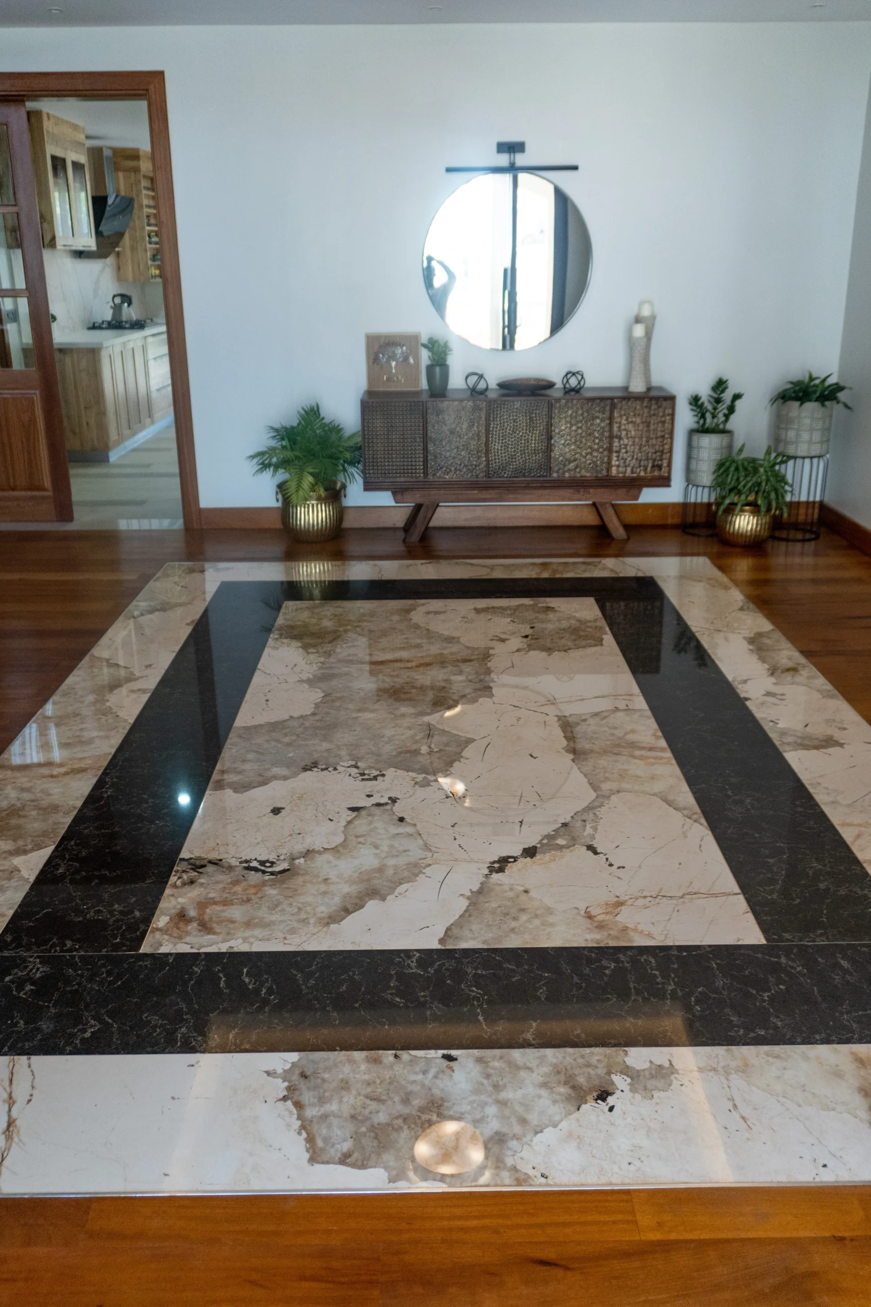 Custom Entrance Flooring, Dekton Khalo Framed in Caesarstone Empira Black, Kenya photo 2