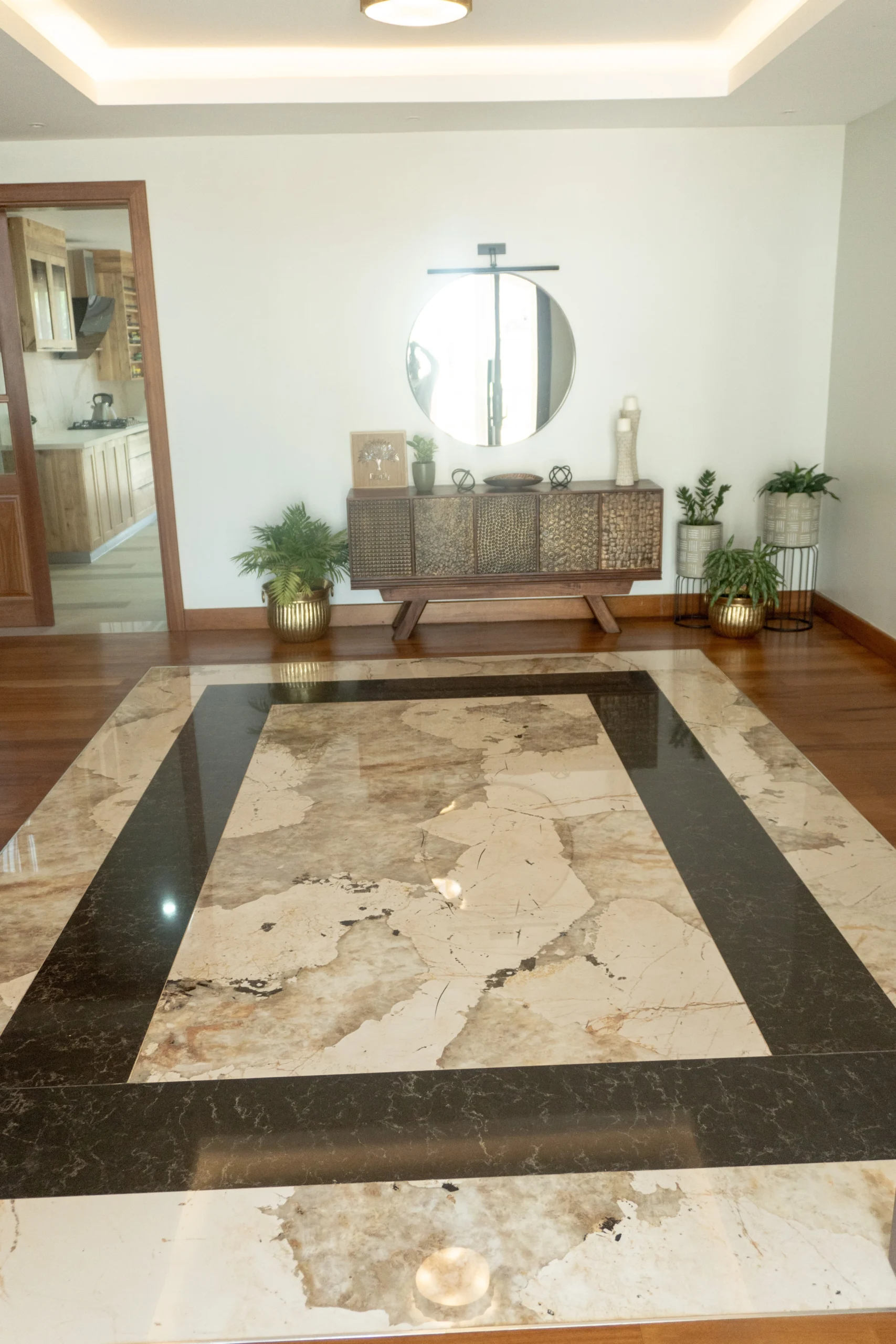 Custom Entrance Flooring, Dekton Khalo Framed in Caesarstone Empira Black, Kenya photo 3