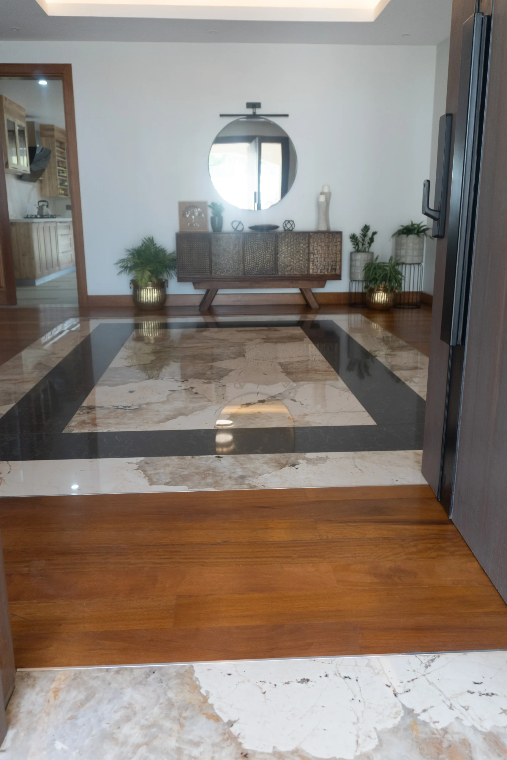 Custom Entrance Flooring, Dekton Khalo Framed in Caesarstone Empira Black, Kenya photo 5