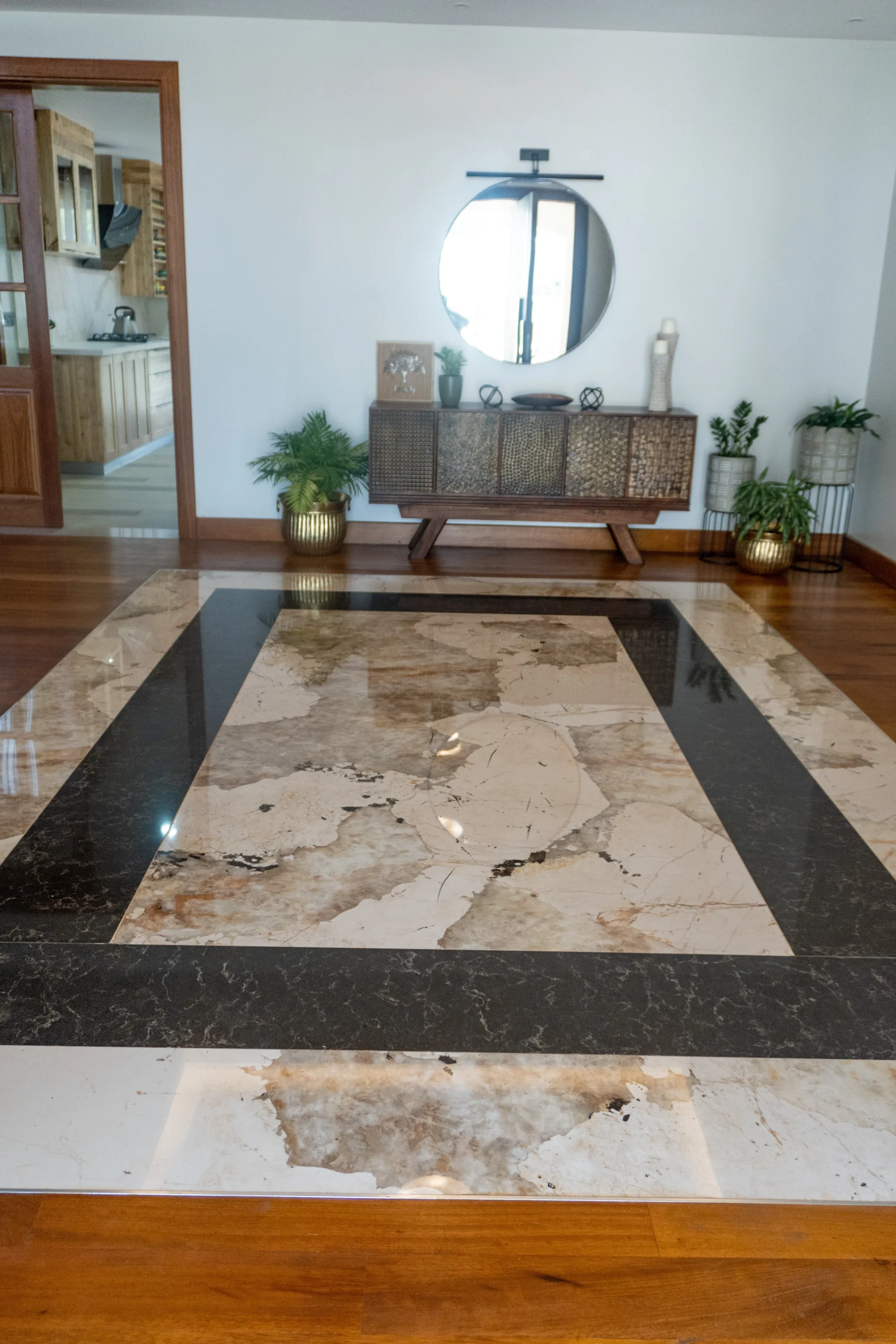 Custom Entrance Flooring, Dekton Khalo Framed in Caesarstone Empira Black, Kenya